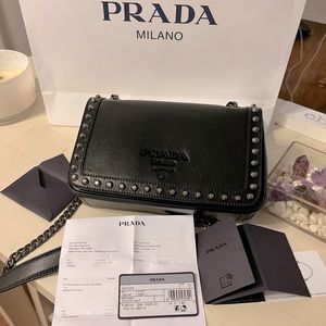 Brand New Prada Nero Glace Calf Leather in Nero, with gunmetal Stud Accents